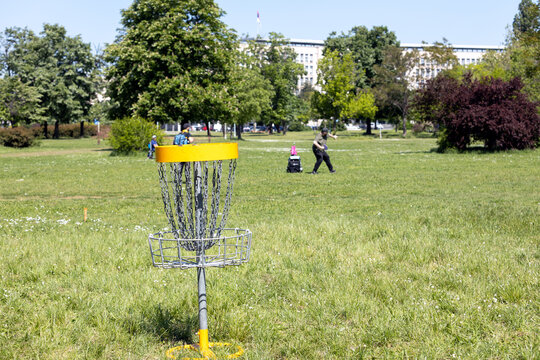 People playing flying disc sport game in the park