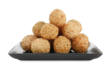 Many delicious sesame balls on white background