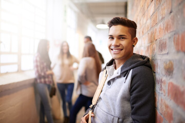 Education, smile and portrait of man in college hallway for studying, learning and scholarship....