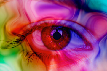 Close-up of a beautiful girl eye with colorful background