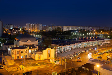 Top view of the railway station buildings in Astrakhan, old and modern at night. Astrakhan, Russia