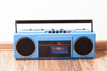 Retro portable stereo cassette recorder from 80s.