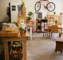 Interior, space and empty coffee shop with table, chairs and furniture or small business, bistro or...