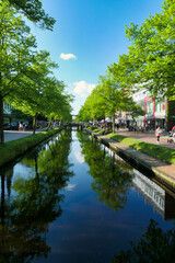 Fototapeta na wymiar Die Innenstadt von Papenburg im Emsland/ Deutschland Blick auf die Kanäle im Frühjahr