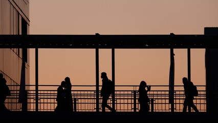 silhouette of people at sunset