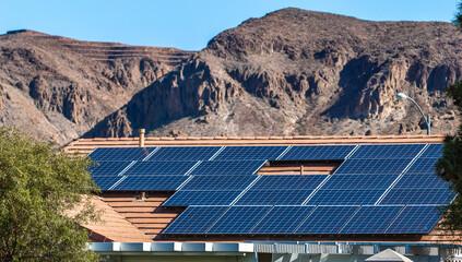 House with roof top solar panel installed in desert area