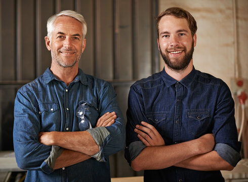 Carpenter, happy portrait and arms crossed of architecture team with a smile from startup. Entrepreneur, partnership and architect workers together with pride and success from small business