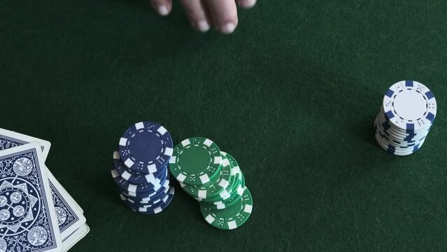 poker game on green cloth