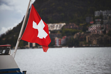 Flag of Switzerland. A red flag with a white cross on it. Swiss flag.