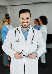 doctor nurse portrait man hospital group team medical uniform health surgeon adult stethoscope smiling professional clinic medicine male happy female occupation teamwork care