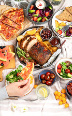 Family dinner or lunch. Many dishes on the table. Top view, copy space