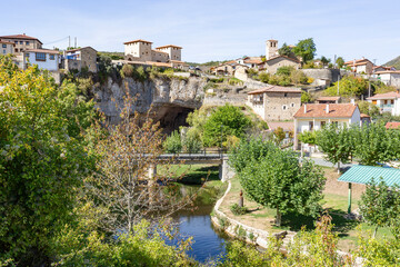 Fototapeta na wymiar a view of Puentedey village over the natural bridge on the Nela river, Merindad de Valdeporres, province of Burgos, Castile and León, Spain