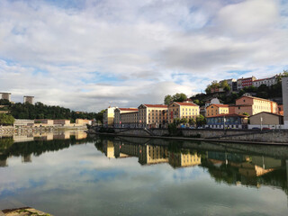 Fototapeta premium Morning light and reflections on Saone river, quay Saint Vincent, and 