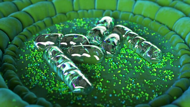 A metal bubble inflates on the floor and turns into a logo. Letter M. Green particles and inflatable circles around.