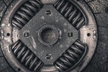 Old clutch durring replacement in a garage close up