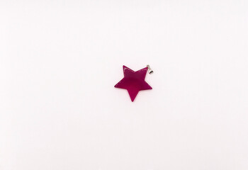 Pink pendant isolated on white background.