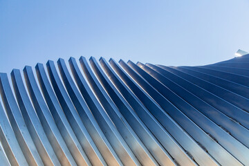 architecture and site concept - close up of modern building construction part over blue sky - Powered by Adobe