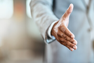 Handshake, offer and business man success, partnership agreement or introduction in job welcome. Professional person shaking hands in pov meeting, deal congratulations and thank you on mockup space