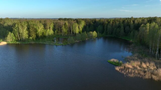 Aerial view of small lake in Warmia, northern Poland, Europe