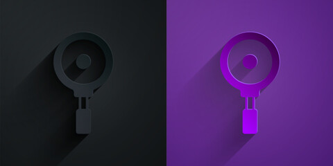Paper cut Frying pan icon isolated on black on purple background. Fry or roast food symbol. Paper art style. Vector
