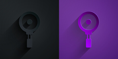Paper cut Frying pan icon isolated on black on purple background. Fry or roast food symbol. Paper art style. Vector