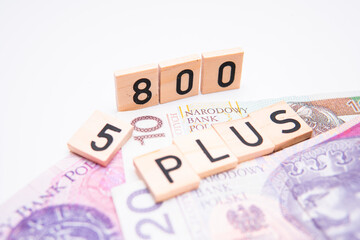 inscription 800 plus next to Polish money. Revaluation of the 500 plus program in Poland. Election...