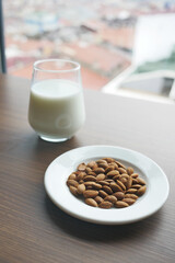  almond nut and milk on table 