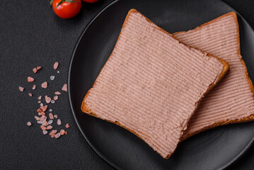 Delicious crispy toast with chicken or goose pate with salt and spices