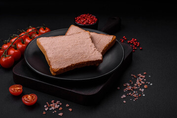Delicious crispy toast with chicken or goose pate with salt and spices