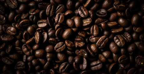 Obraz premium Close-up top view of beautiful composition of aromatic dark roasted coffee beans