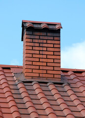 Chimney on the roof of the house.