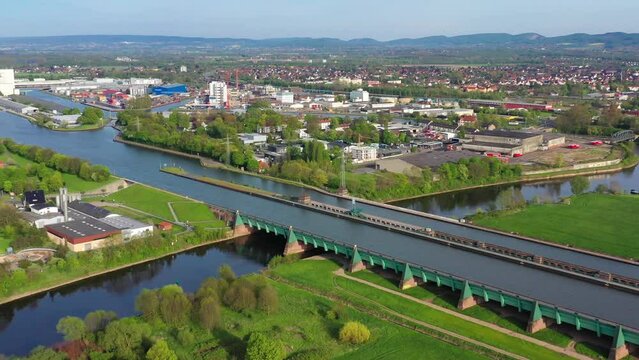 Aerial view of Minden Water Bridge over Weser River, Mittellandkanal, Minden, Germany. High quality 4k footage