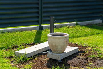 Clay jug in the yard in the garden.