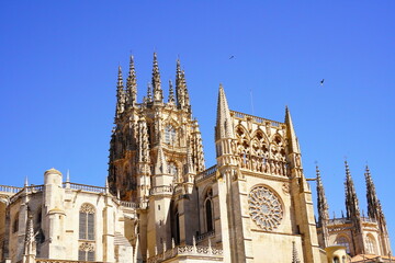 Fototapeta na wymiar Our Lady of Burgos, Burgos cathedral in blue sky, Spain