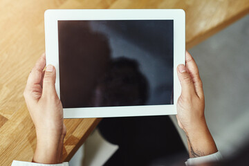 Hands, tablet and screen with a business person working online in the office for information research. Technology, internet and display with a corporate employee accessing a database from above