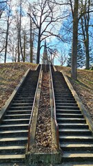 Fototapeta premium The steps of the stairs are laid on top of large hill to the Lutheran Church