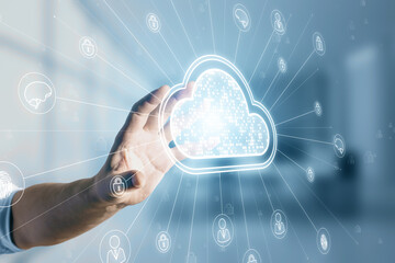 Close up of male hand using digital white cloud hologram with various icons on blurry office interior background. Cloud computing and storage server concept.