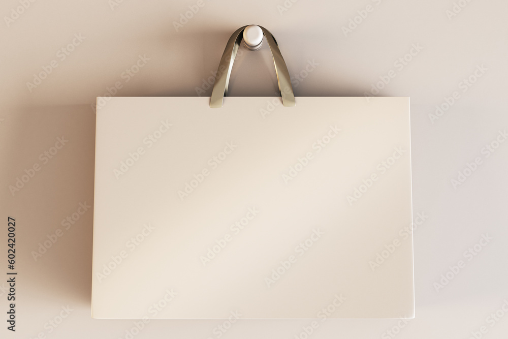 Poster shopping or present concept with front view on blank beige craft bag with golden handles and place f