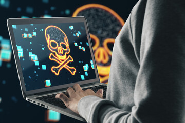 Side view of hacker using laptop with glowing digital binary code skull on blurry dark background. Hacking, piracy, malware and data theft concept.