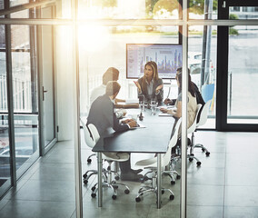 Obraz premium Business meeting, coaching and people in office for planning, discussion and problem solving. Team, collaboration and woman leader with group in a boardroom for sharing training, growth and vision