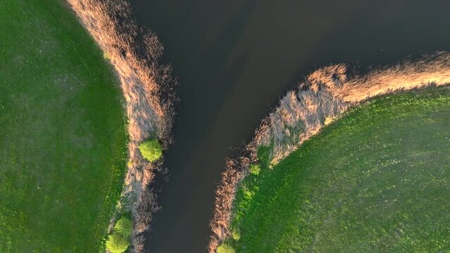 Top view of small river Lyna flowing in Warmia, northern Poland, Europe