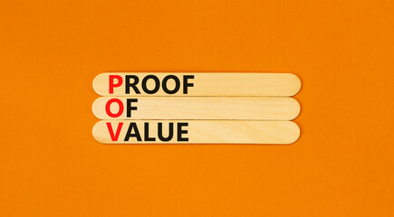 POV Proof of value symbol. Concept words POV Proof of value on beautiful wooden sticks. Beautiful orange table orange background. Business and POV Proof of value concept. Copy space.