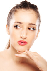 Beautiful girl close up studio portrait against white background.