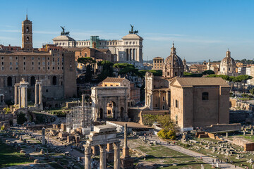 View of the Roman Forum with the Altare della Patria (Vittoriano) in the background, Rome, Italy - obrazy, fototapety, plakaty