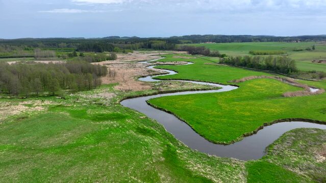 Top view of small river Lyna flowing in Warmia, northern Poland, Europe