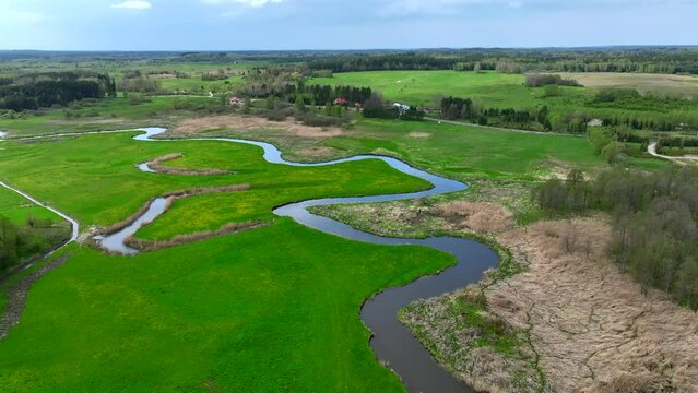 Top view of small river Lyna flowing in Warmia, northern Poland, Europe