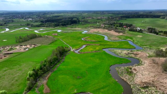 Top view of small river Lyna flowing in Warmia, northern Poland, Europe