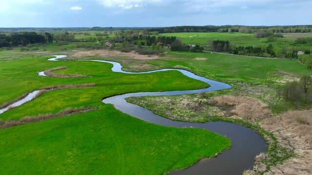 Top view of small river Lyna flowing in Warmia, northern Poland, Europe