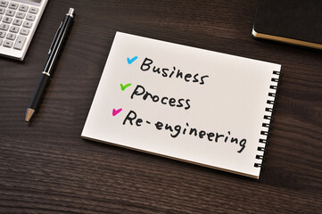 There is notebook with the word Business Process Re-engineering.It is as an eye-catching image.