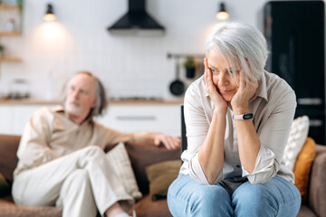 Mature caucasian spouses misunderstanding each other, experiencing crisis in relationship, offended...